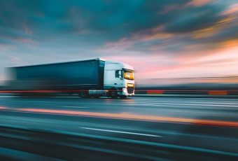 truck-is-speeding-road_1282306-736